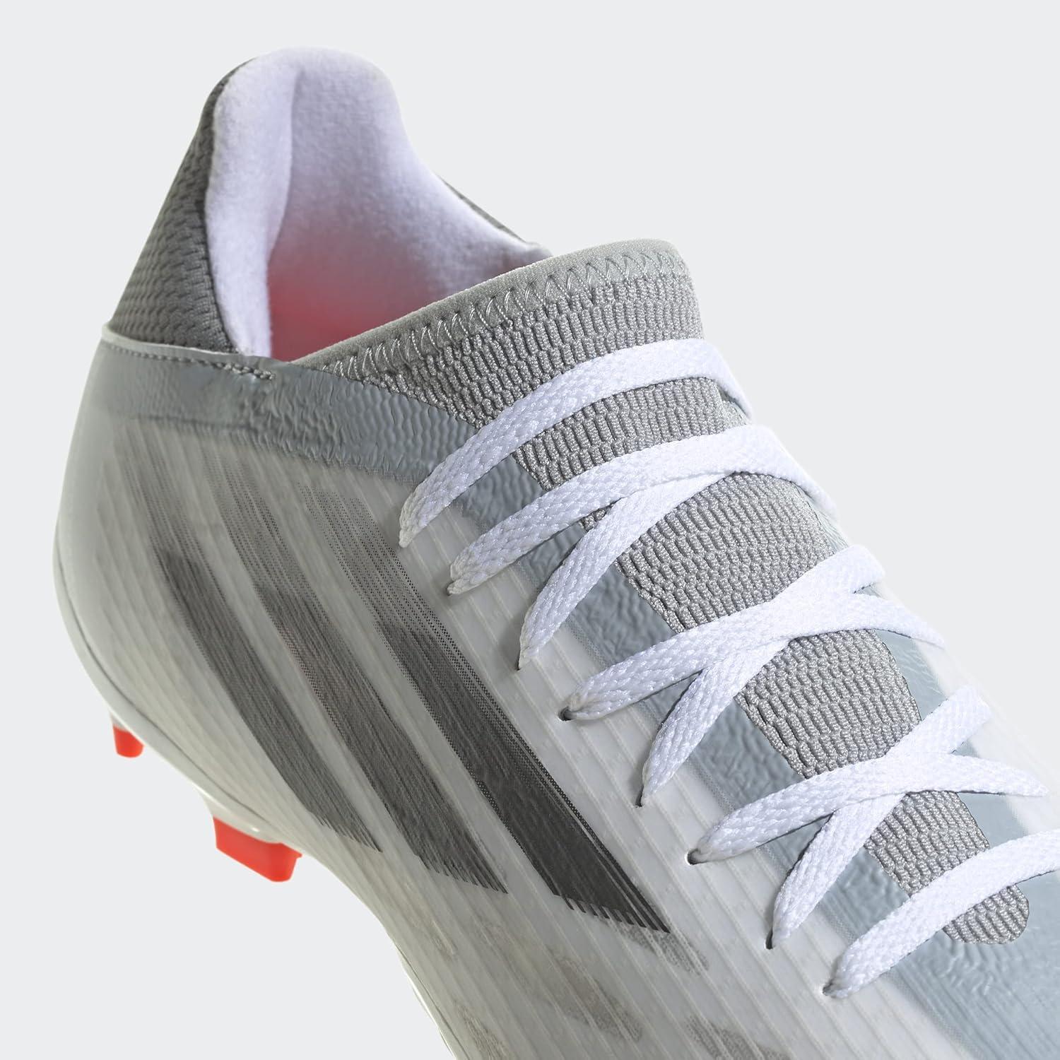 imageadidas UnisexAdult X Speedflow Messi3 Firm Ground Soccer ShoeWhiteBlackSolar Red