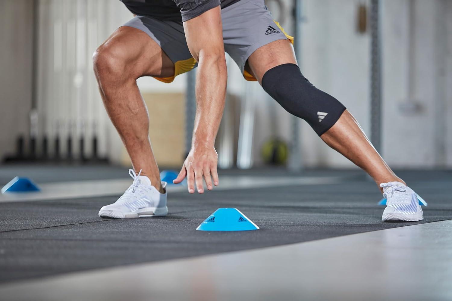 imageadidas Elbow Support Sleeve Seamless and Smooth Elbow Support for Training Competitions and General Fitness Ergonomic Design Nylon Trim Durable ampamp Breathable Black Red Logo Largeadidas Knee Support