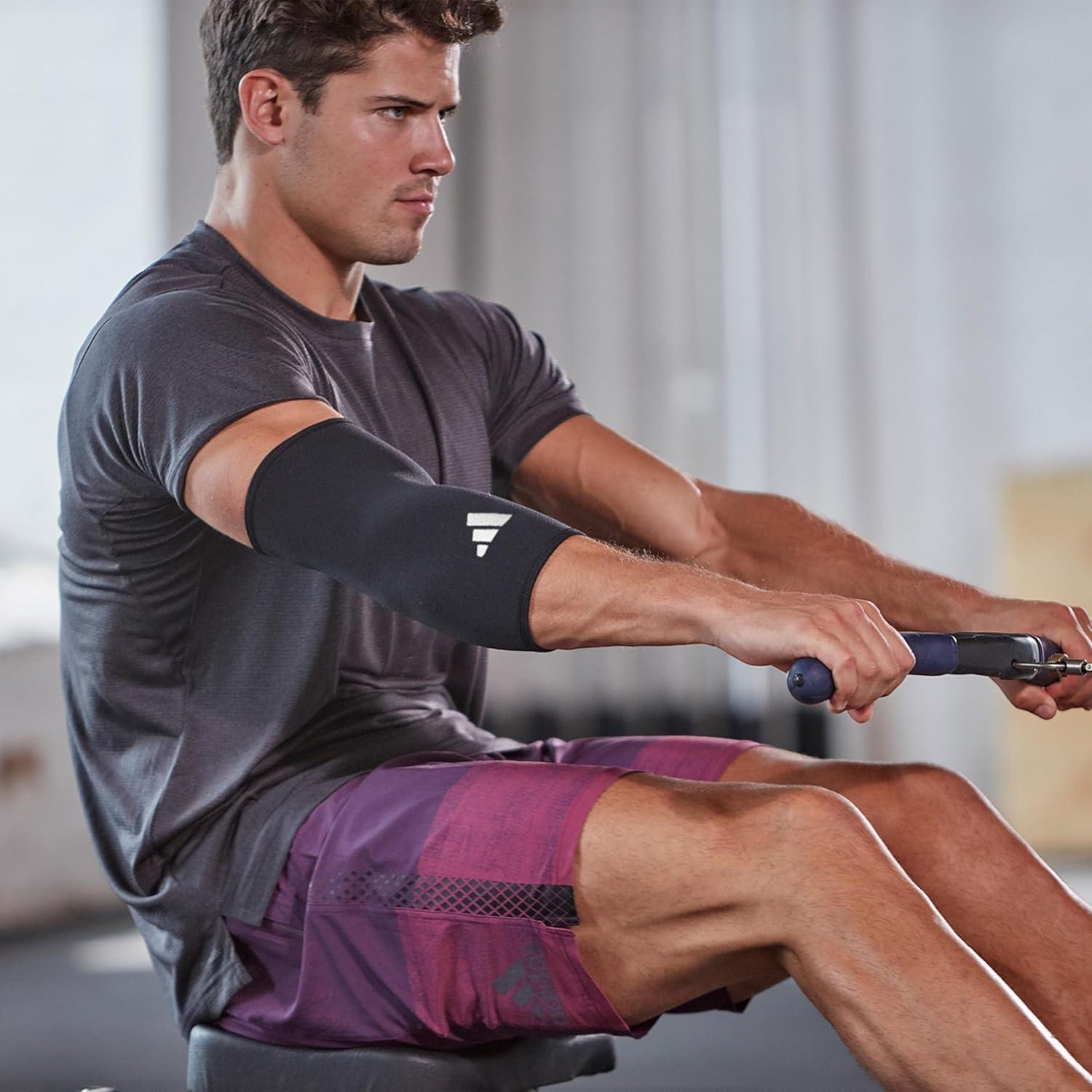imageadidas Elbow Support Sleeve Seamless and Smooth Elbow Support for Training Competitions and General Fitness Ergonomic Design Nylon Trim Durable ampamp Breathable Black Red Logo Largeadidas Elbow Support