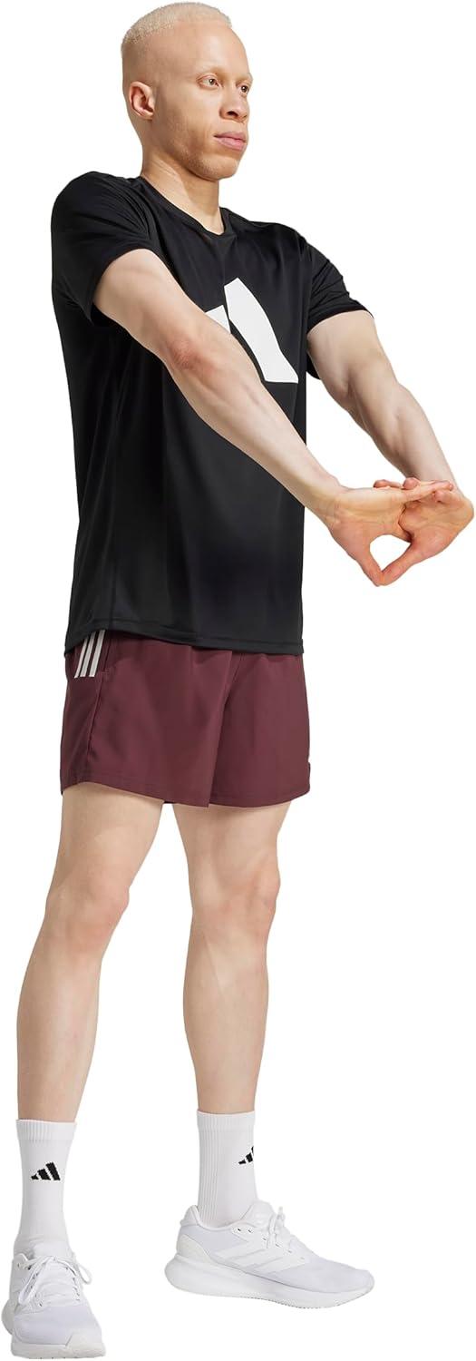 imageadidas Mens Own The Run ShortAurora Ruby