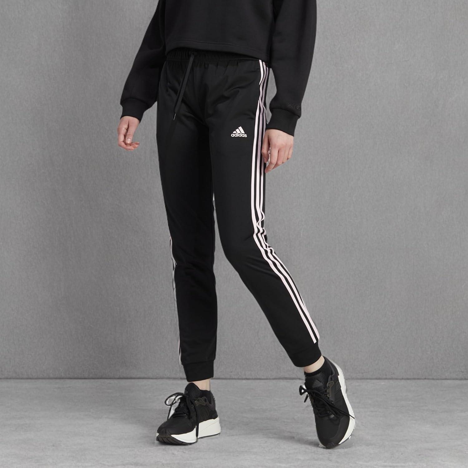 imageadidas Womens Essentials Fleece Tapered Cuff PantsBlackClear Pink