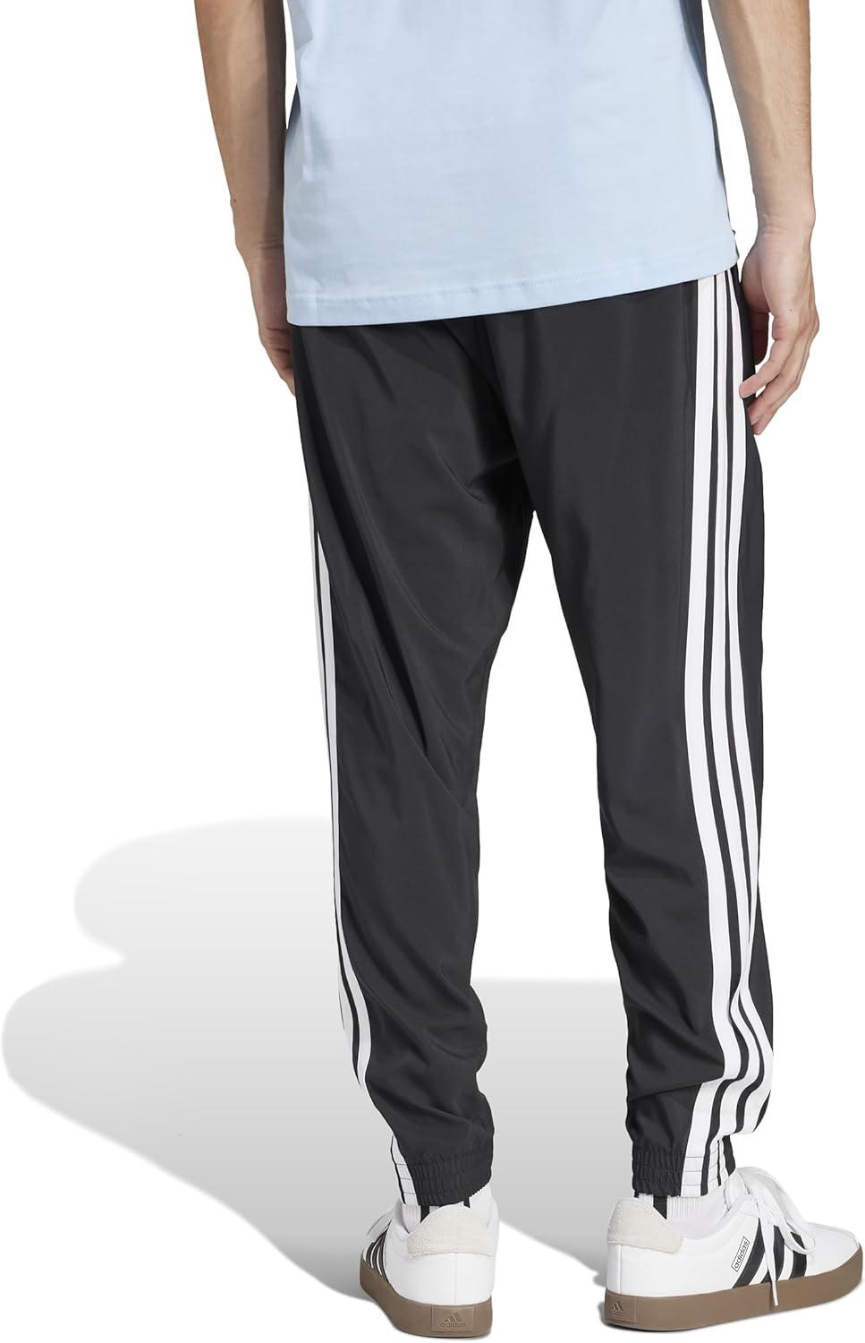 imageAdidas Mens Essentials 3Stripes Woven PantsBlackWhite