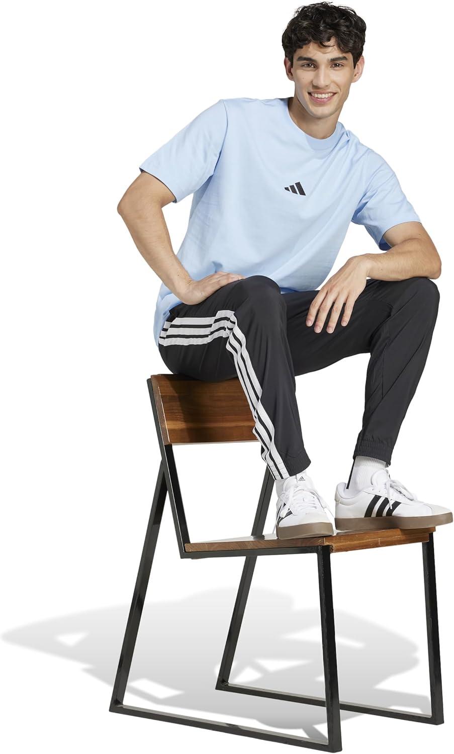 imageAdidas Mens Essentials 3Stripes Woven PantsBlackWhite