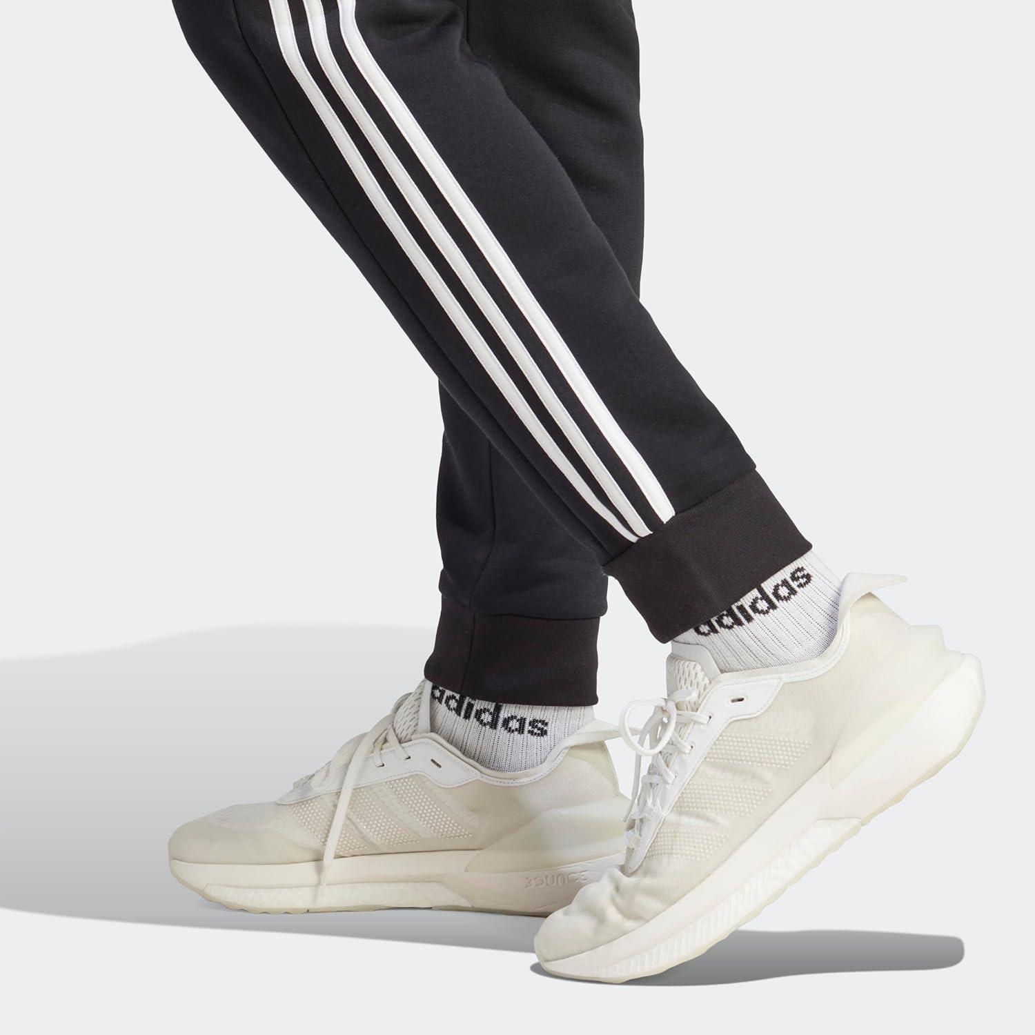 imageadidas Mens Essentials 3Stripes Fleece Tapered Cuff PantsBlack White