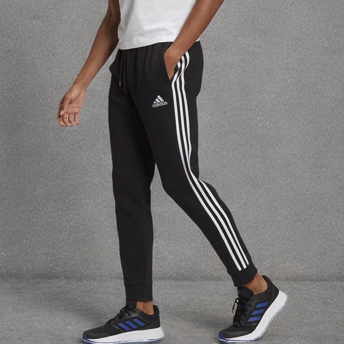 imageadidas Mens Essentials 3Stripes Fleece Tapered Cuff PantsBlackWhite
