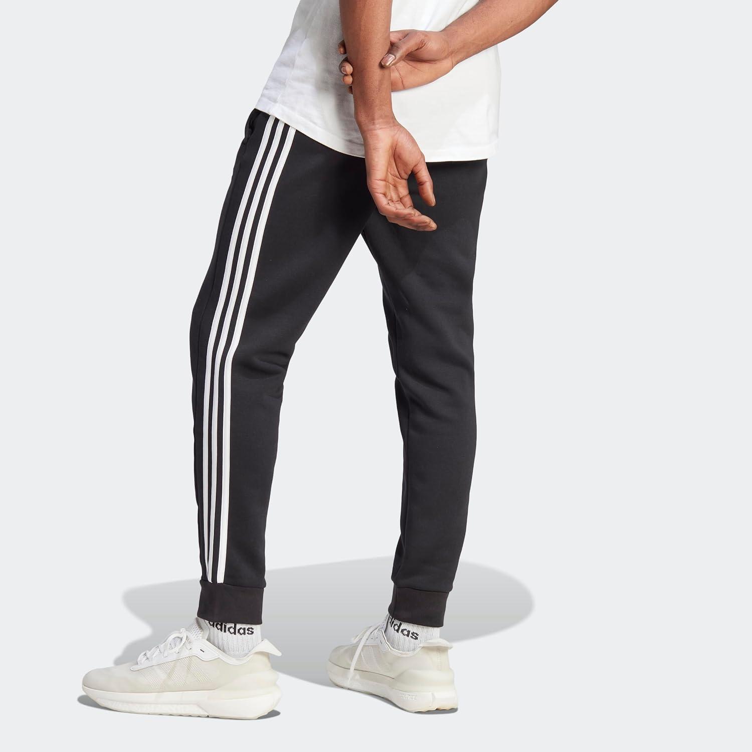 imageadidas Mens Essentials 3Stripes Fleece Tapered Cuff PantsBlackWhite