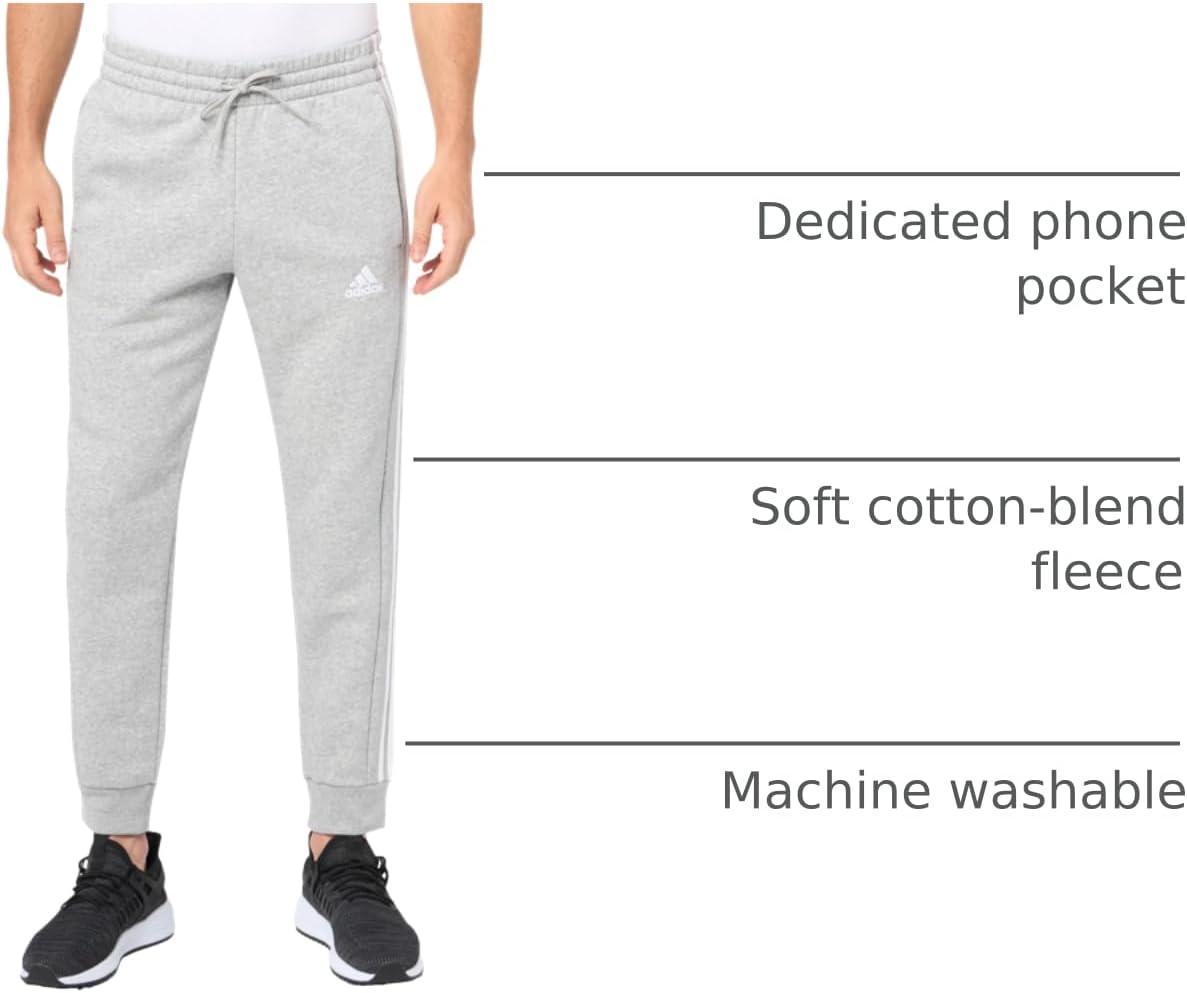 imageadidas Mens Essentials 3Stripes Fleece Tapered Cuff PantsMedium Grey Heather