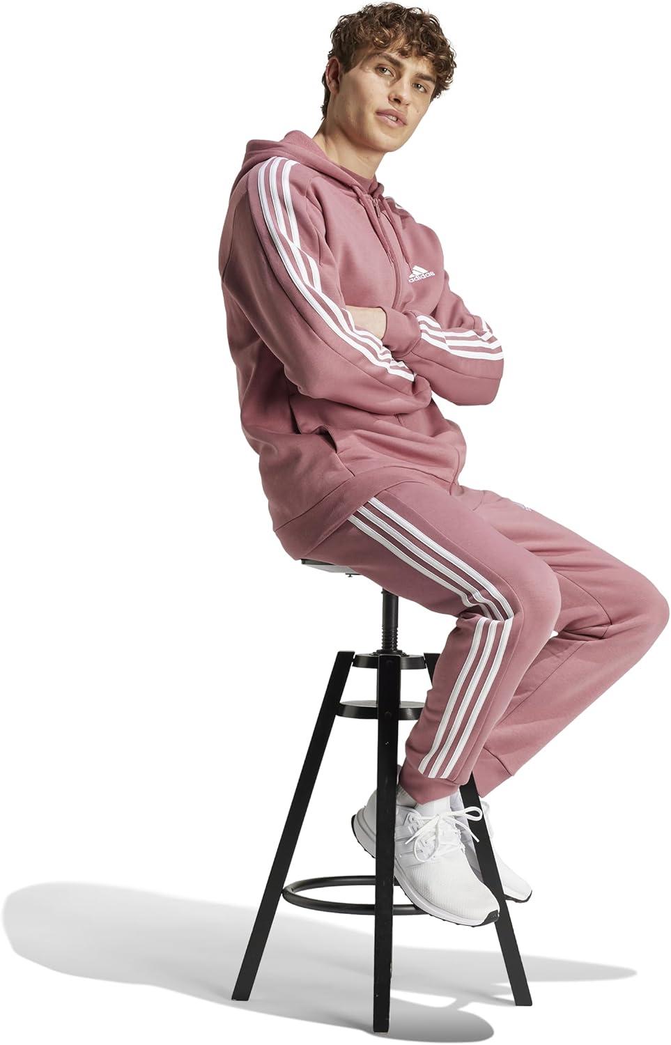 imageadidas Mens Essentials 3Stripes Fleece Tapered Cuff PantsPreloved Crimson