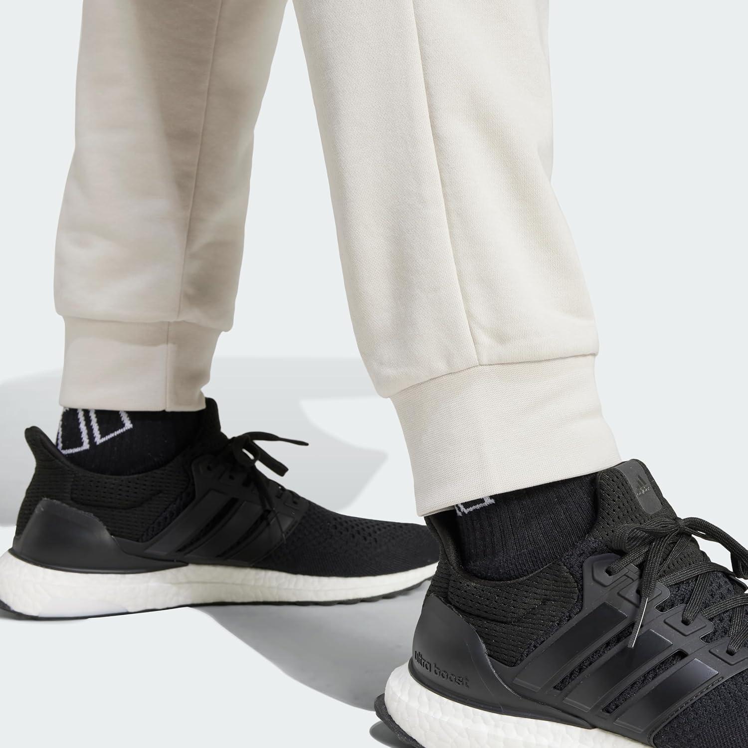 imageadidas Mens Essentials Feel Cozy French Terry PantsWonder Alumina White