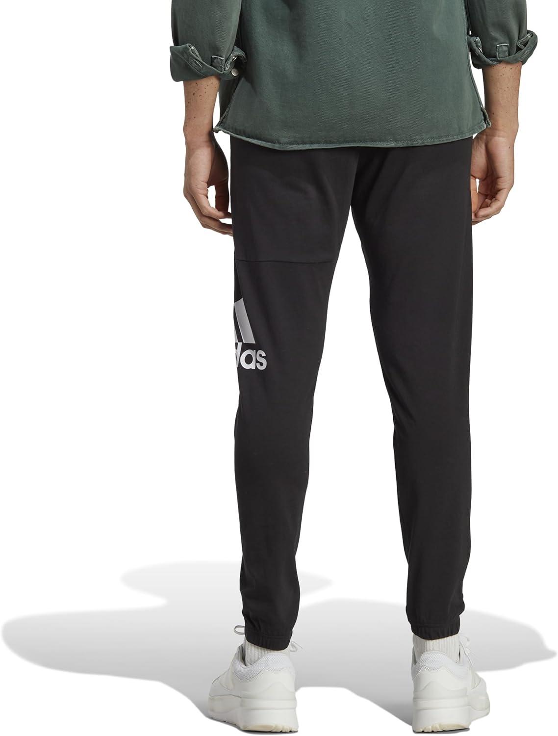 imageadidas Mens Essentials Logo Tapered Badge SweatpantsBlack
