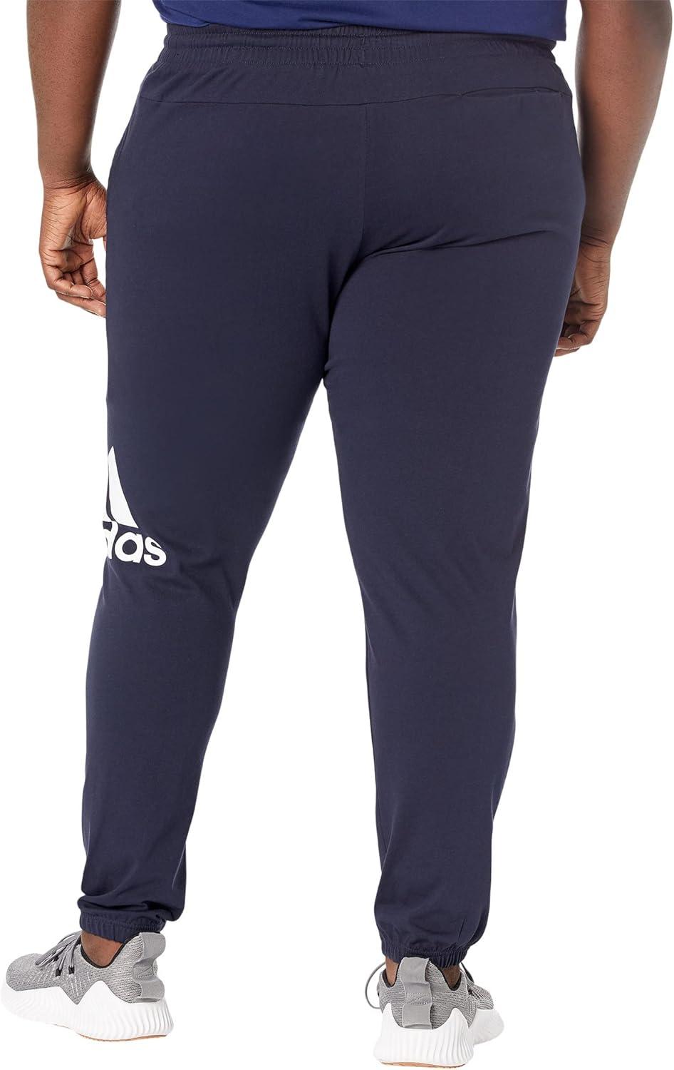 imageadidas Mens Essentials Logo Tapered Badge SweatpantsInk