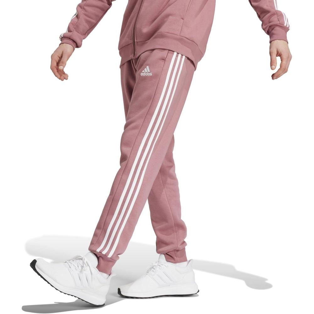 imageadidas Mens Essentials 3Stripes Fleece Tapered Cuff PantsPreloved Crimson