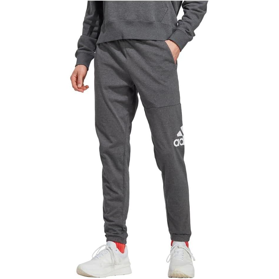 imageadidas Mens Essentials Logo Tapered Badge SweatpantsDark Grey Heather