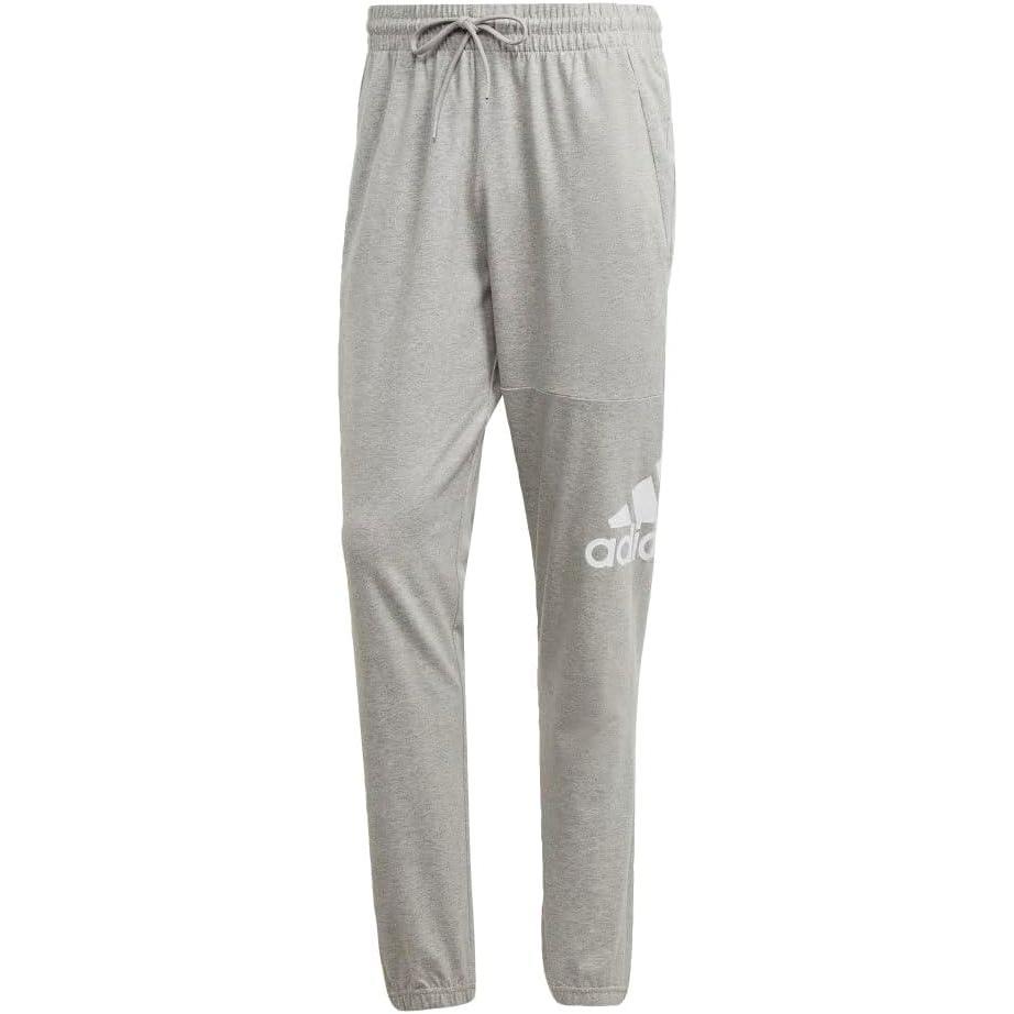 imageadidas Mens Essentials Logo Tapered Badge SweatpantsMedium Grey Heather