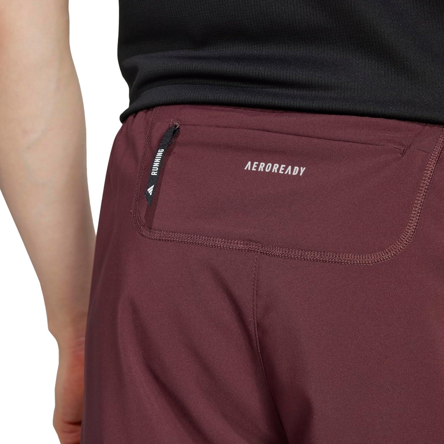 imageAdidas Mens Own The Run ShortAurora Ruby