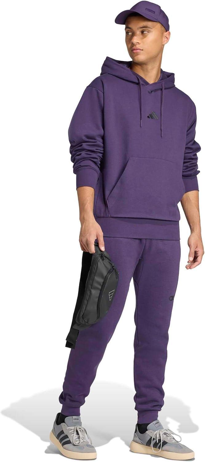 imageadidas Mens Essentials Feel Cozy Fleece Hoodie SweatshirtAurora PlumBlack