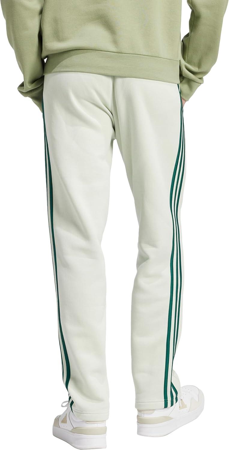imageAdidas Mens Essentials 3Stripes Regular Tricot PantspantsLinen Green
