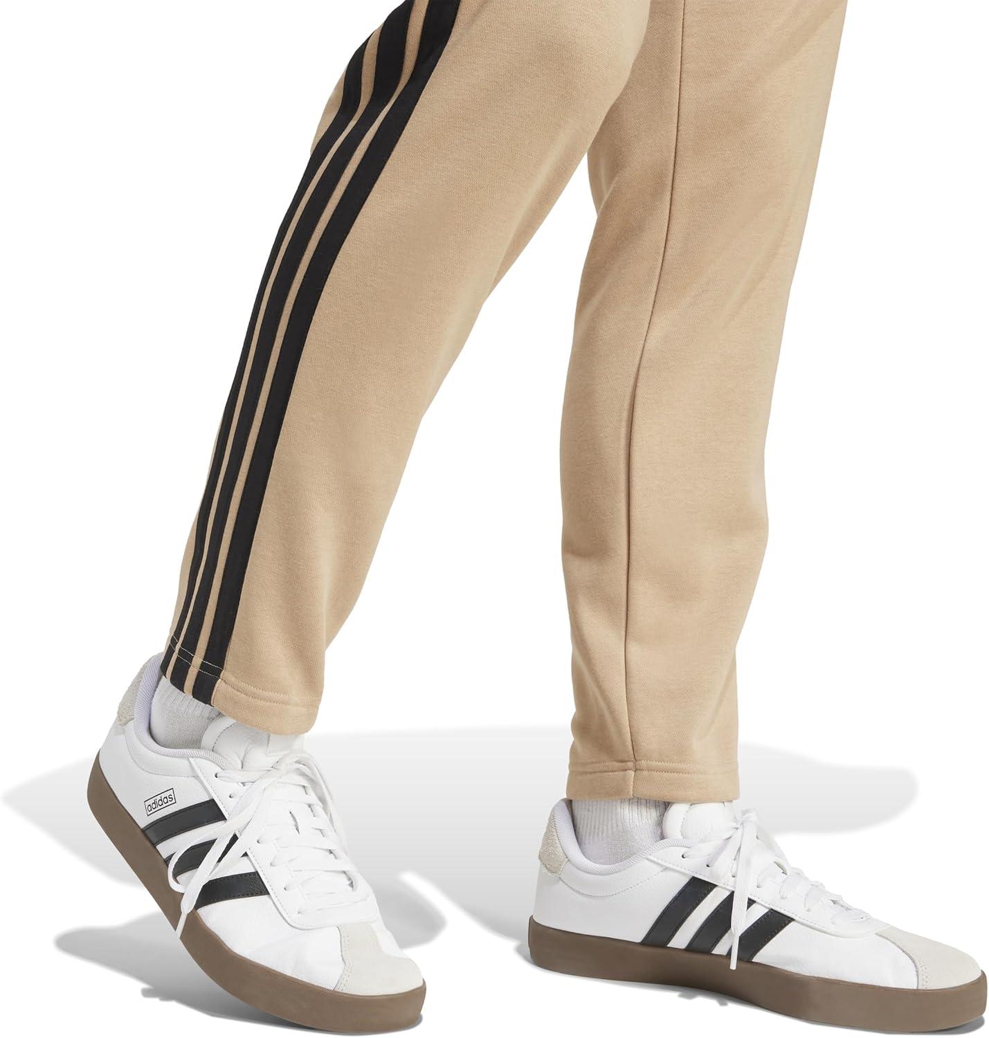 image:imageadidas Mens Essentials 3Stripes Regular Tricot PantsWarm SandstoneBlack