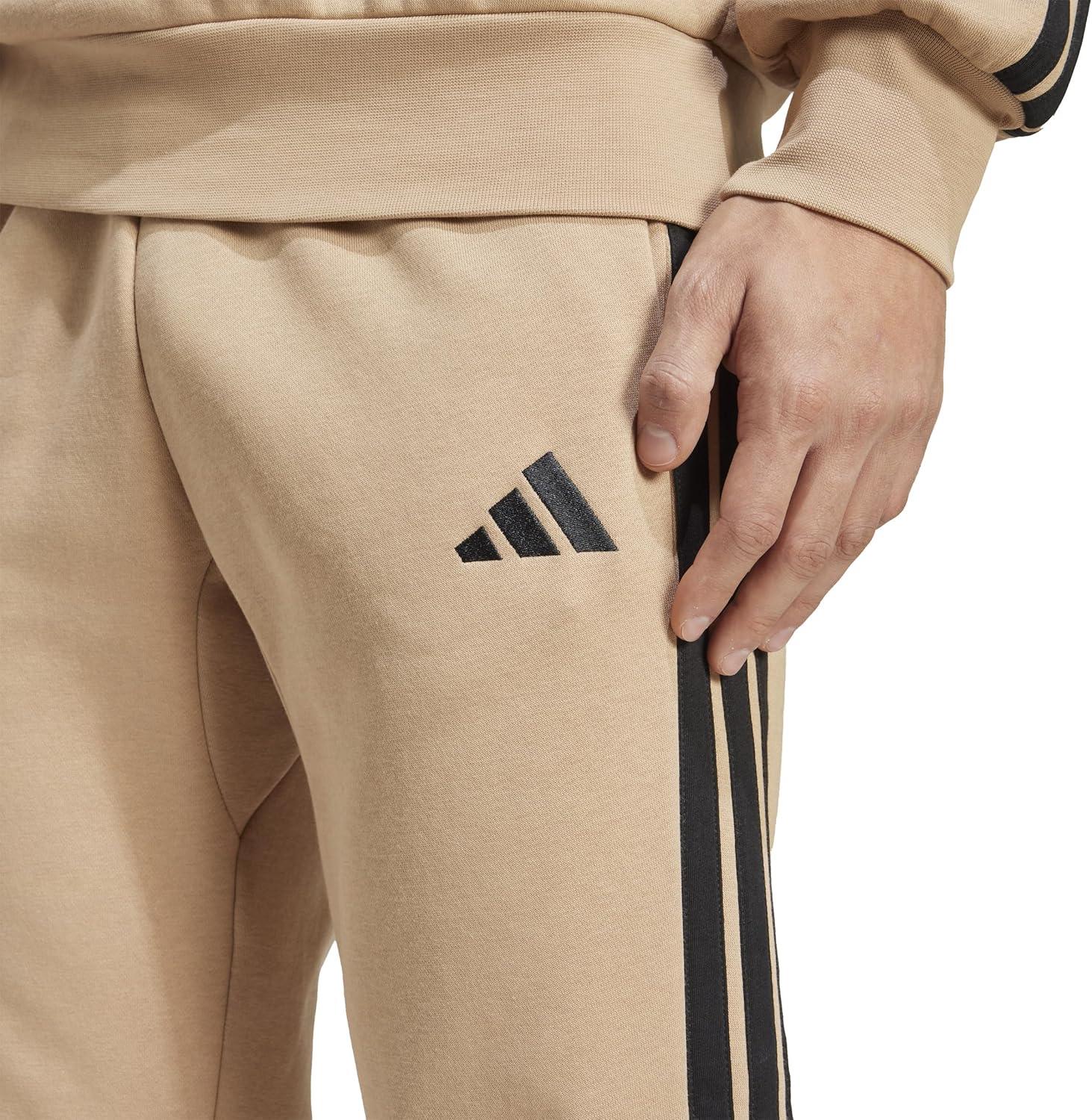 image:imageadidas Mens Essentials 3Stripes Regular Tricot PantsWarm SandstoneBlack